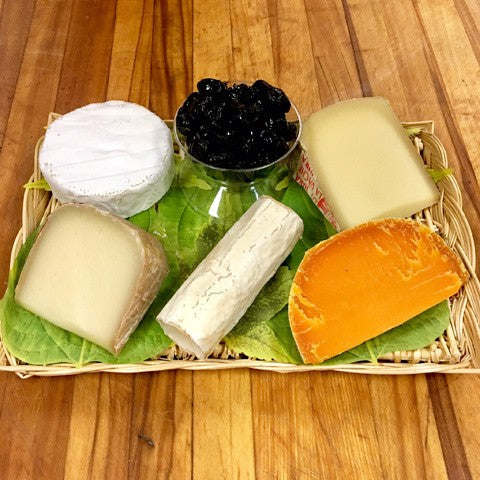 Tray with different types of cheese and other items